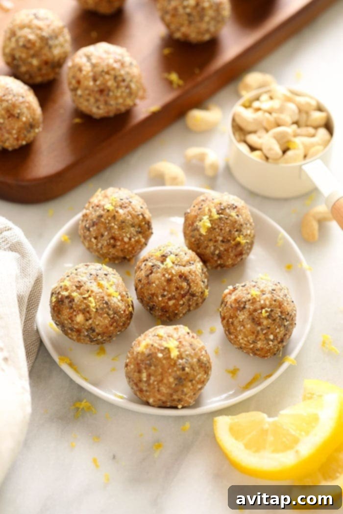 Zesty Lemon Power Bites 5 Finished Lemon Cake Energy Balls garnished with lemon zest on a plate