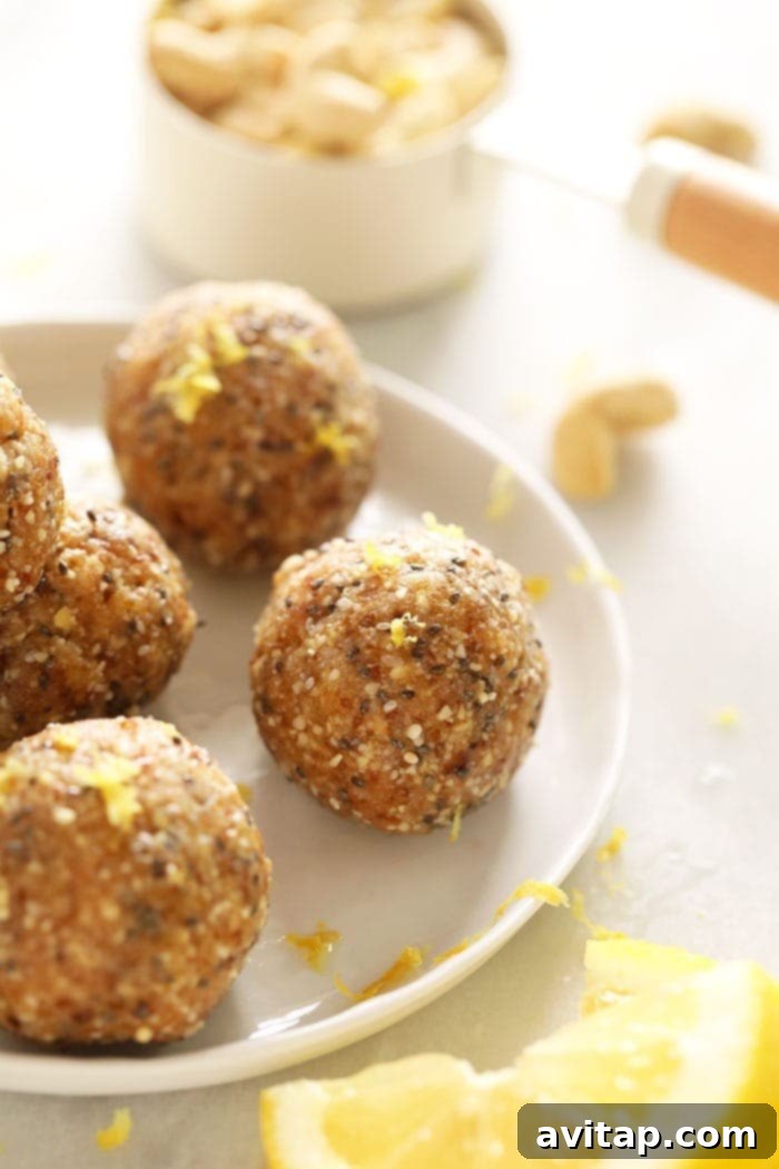 Close-up of Lemon Cake energy balls showcasing their texture and vibrant zest