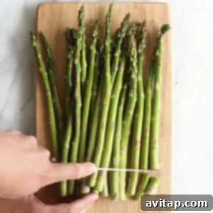 slicing asparagus.