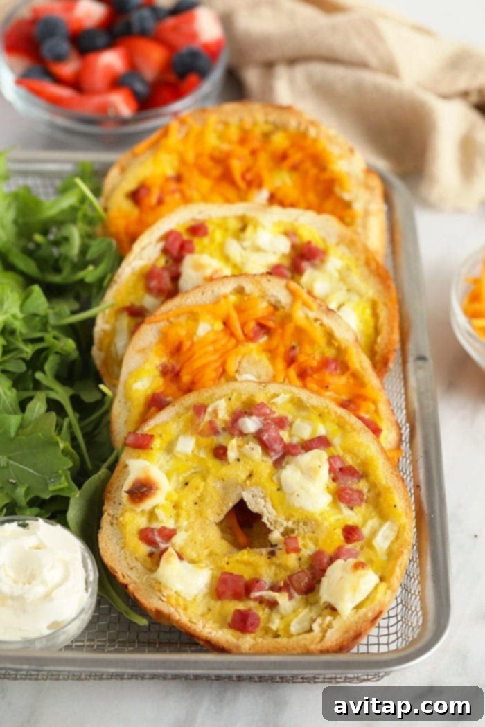 Basket filled with golden brown Bagel Ham and Cheese Quiches, ready for a delicious breakfast