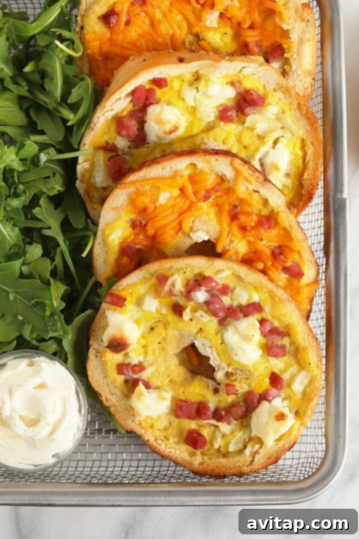 A rustic basket filled with freshly baked, golden brown Bagel Ham and Cheese Quiches