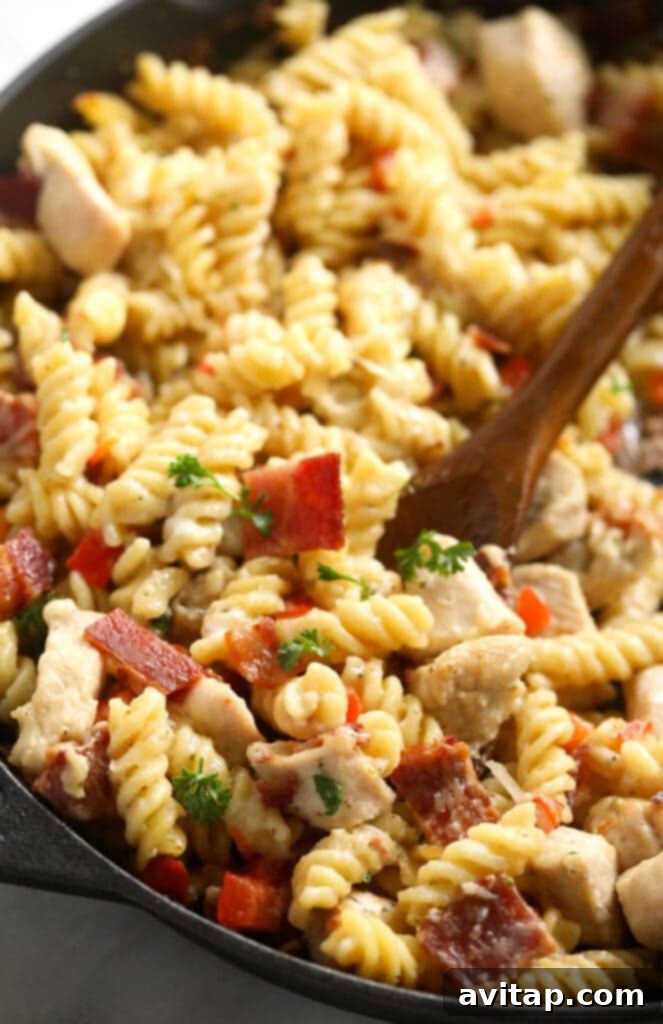 All the flavors you love in casserole form! Make this Chicken Bacon Ranch Casserole for an easy and delicious dinner the whole family will love. Chicken Bacon Ranch Casserole baked in a cast iron skillet.