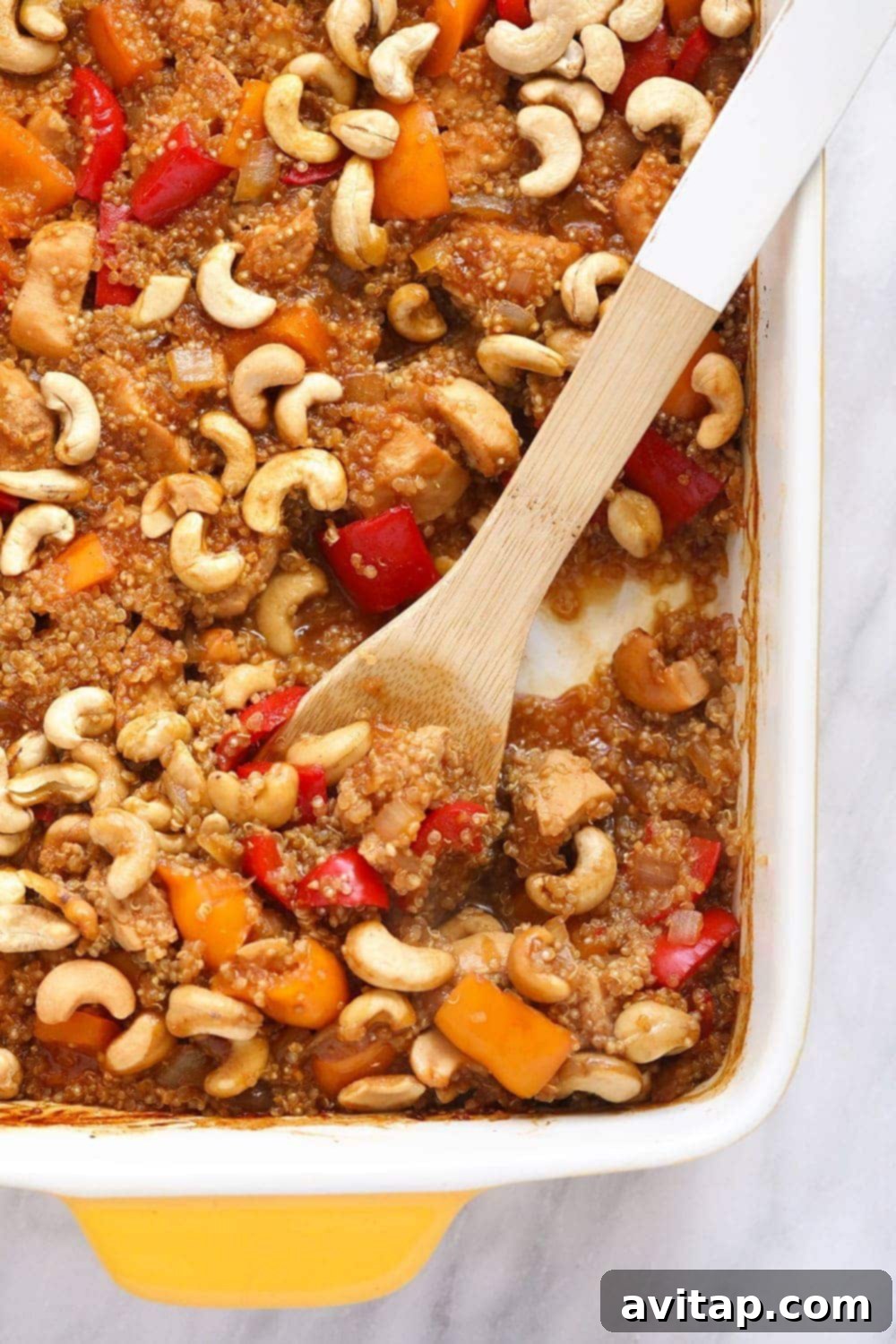 Make this Cashew Chicken Quinoa Bake for a high-protein, one-dish meal that the whole family will love! Meal prep at its finest! A wholesome cashew chicken casserole with quinoa.
