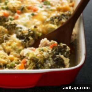 Heartland Chicken Bake 2 Chicken and broccoli casserole recipe. Cheesy, filling, and HEALTHY! Our chicken, broccoli, and rice casserole is made without premade soup, so easy and even more delicious from scratch!