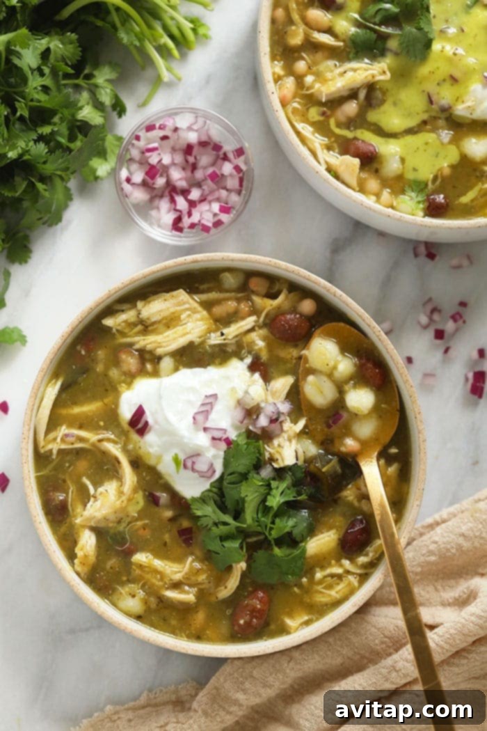 Fresh Green Chilies 2 A steaming bowl of healthy green chicken chili, topped with fresh cilantro and a dollop of sour cream.