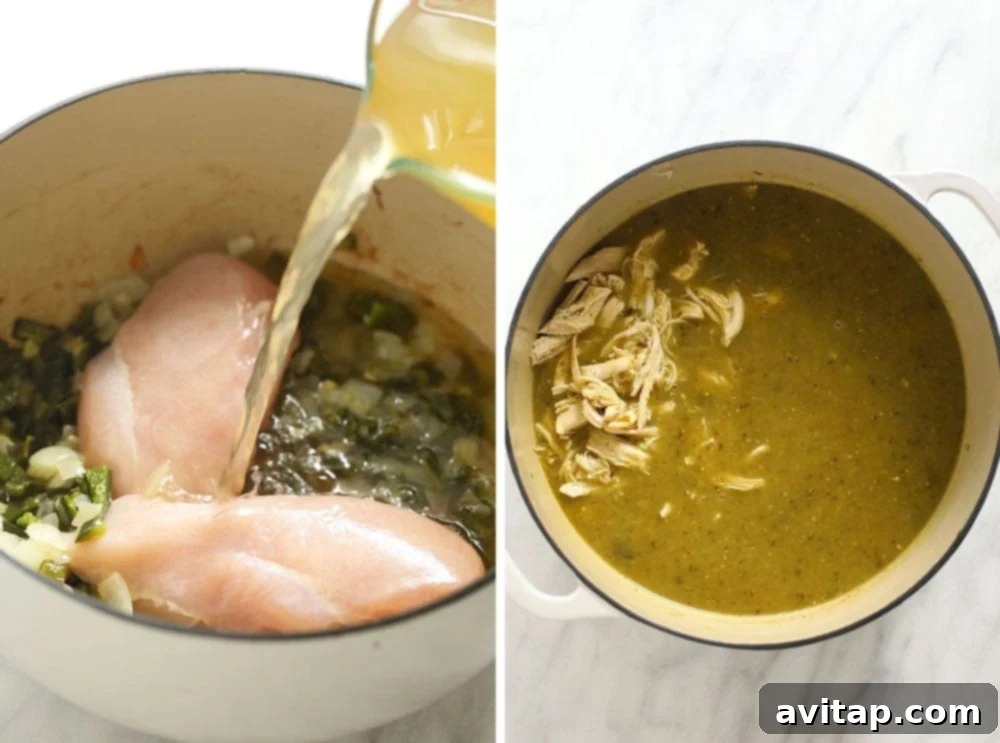 Green Chili (AKA Chile Verde) never looked so good! This easy green chicken chili is made with roasted peppers, your favorite salsa verde, chicken breast, and white beans. A large stockpot filled with simmering green chicken chili, bubbling gently on the stovetop.