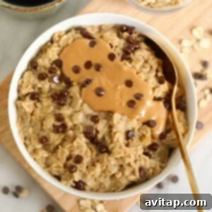 Microwave oatmeal topped with creamy peanut butter and indulgent chocolate chips.