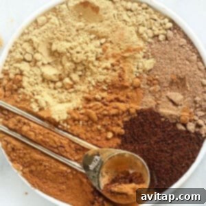 a bowl full of ingredients for a pumpkin spice latte, including pumpkin pie spice.