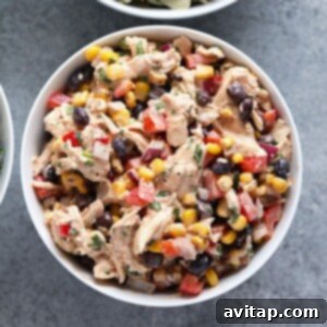A close-up of a Southwest Chicken Salad in a bowl, showcasing its fresh ingredients and creamy texture.
