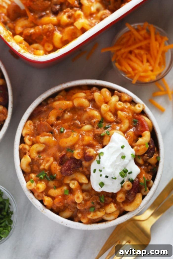 Chili mac and cheese might be the best dinner of all time. Make it once and eat it all week long. Bonus, it's kid-friendly and protein-packed! Chili Mac in a bowl