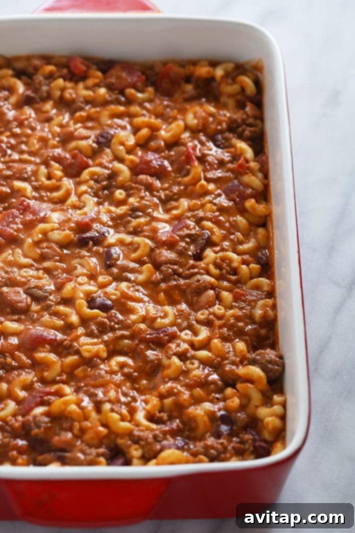 Chili mac and cheese might be the best dinner of all time. Make it once and eat it all week long. Bonus, it's kid-friendly and protein-packed! Chili mac in a casserole dish