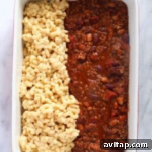 Hearty Chili Macaroni 3 a casserole dish with chili, macaroni and cheese.