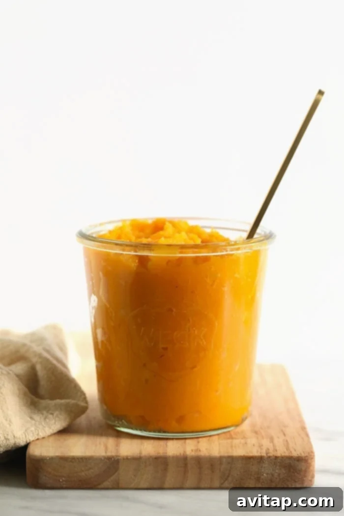 Creamy butternut squash puree in a glass jar, ready for storage or use