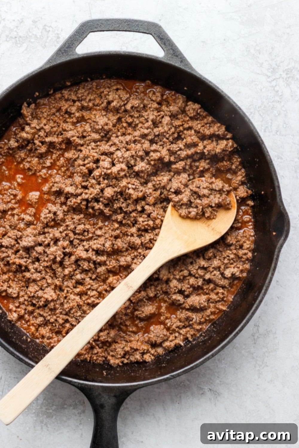 Cooked ground beef with taco seasoning, ready for burritos.