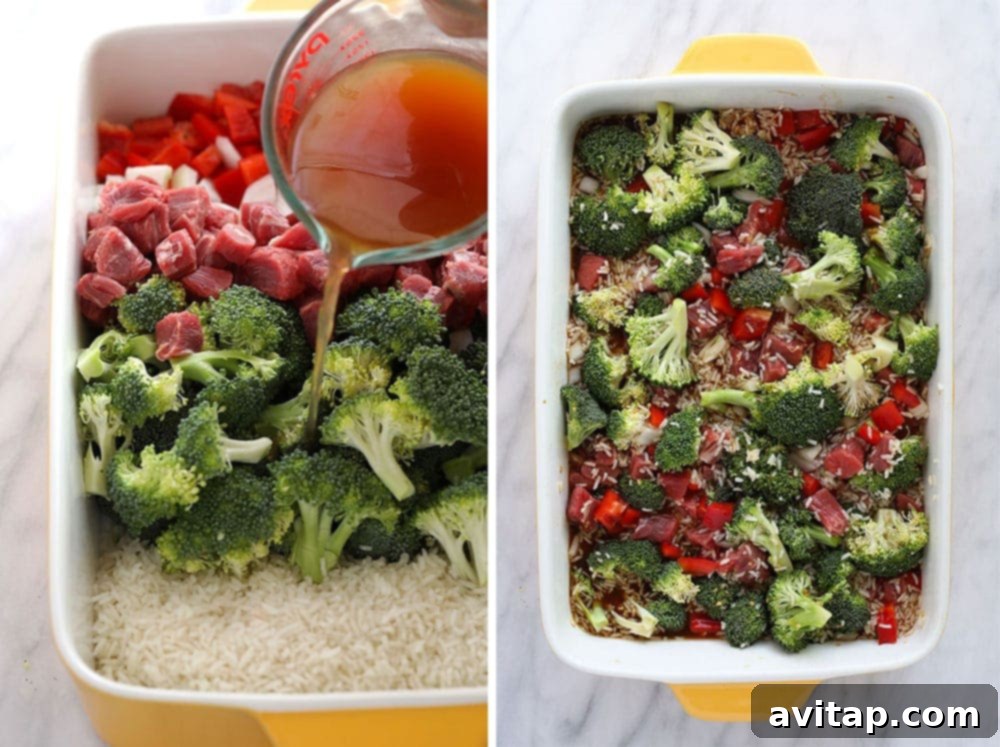 A large rectangular baking dish filled with Beef and Broccoli Casserole, perfectly baked and bubbling