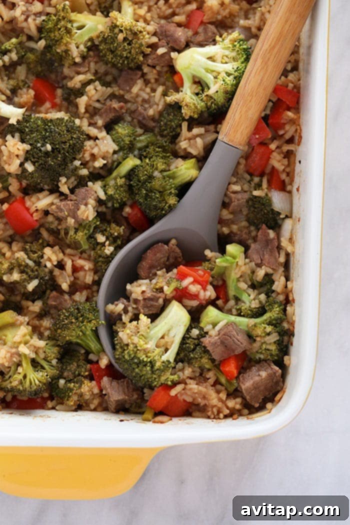Close-up of baked Beef and Broccoli Casserole in a rectangular dish, garnished and ready to serve