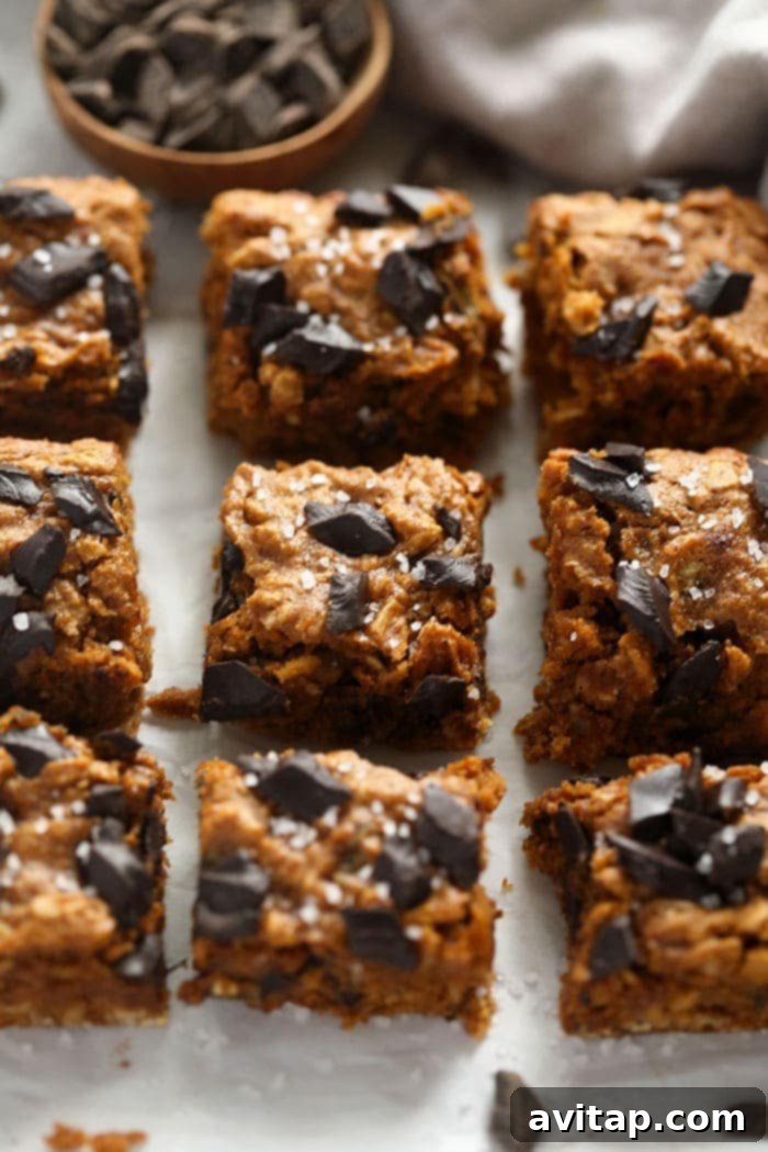Sliced pumpkin cookie bars arranged to show their moist, chewy texture and delicious layers.