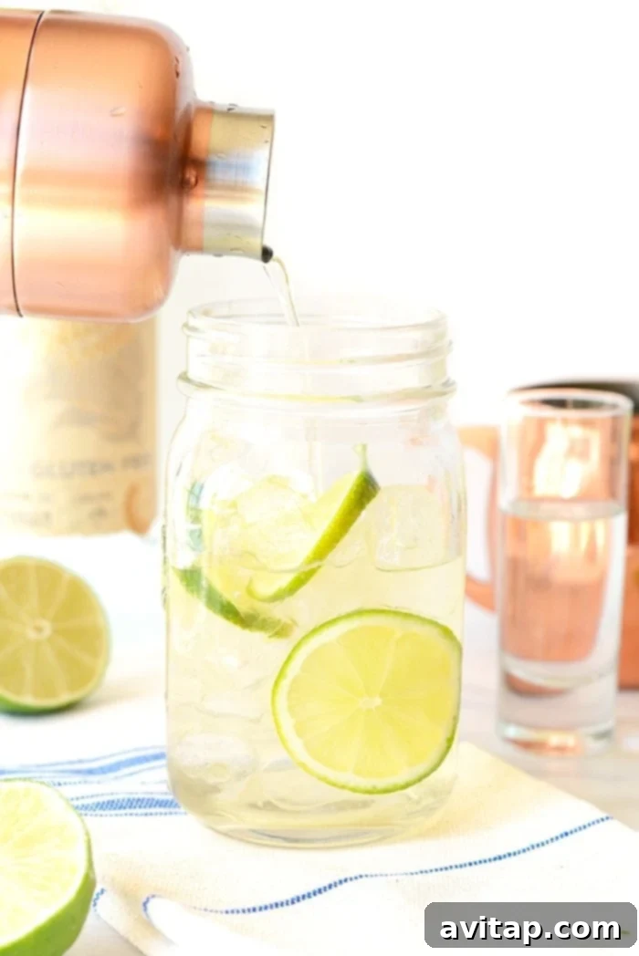 A classic Moscow Mule served in a traditional copper mug, garnished with a lime wedge.