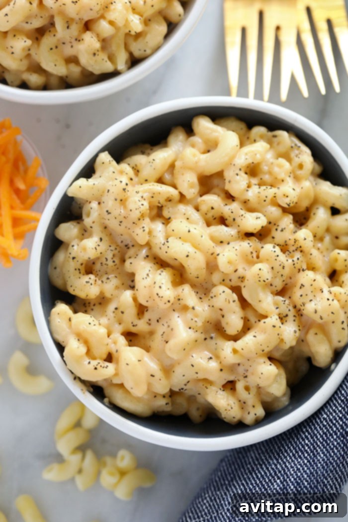 A beautifully presented bowl of creamy mac and cheese, ready to be enjoyed.