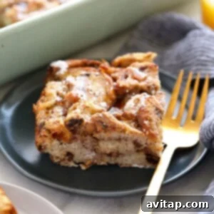 A French toast bake with a fork, ready to be eaten.