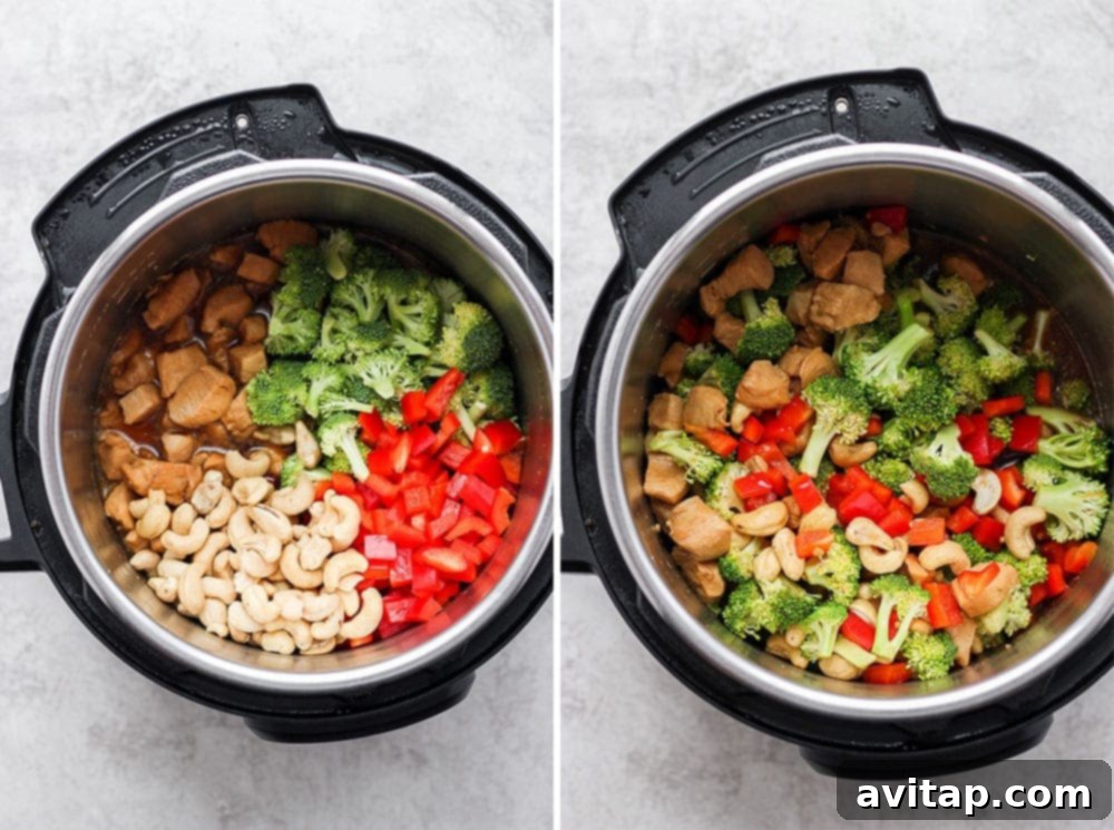 Raw ingredients, including chicken, sauce, and uncooked vegetables, assembled in the Instant Pot before the main cooking phase