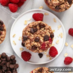 Raspberry Chocolate Chip Oatmeal Muffins 3 Final baked oatmeal cups on a plate, ready to serve