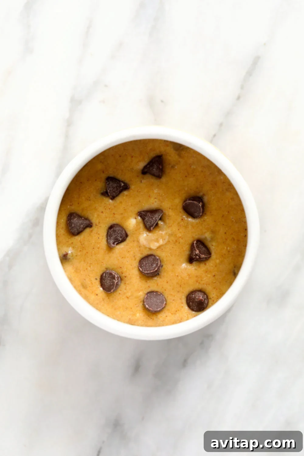 Mixing ingredients in a mug for banana mug cake