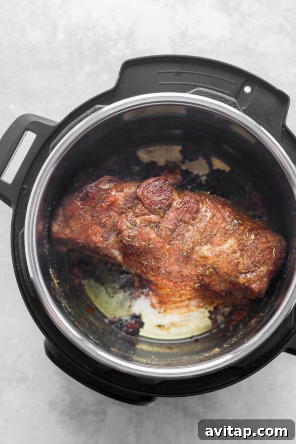Searing pork roast directly in the Instant Pot.