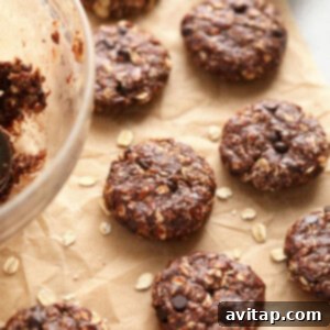 No-bake chocolate oatmeal cookies arranged on a baking sheet, ready to be served.