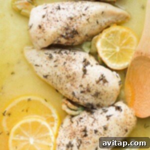 A perfect serving of baked lemon chicken escalopes. Lemon chicken escalopes plated elegantly.