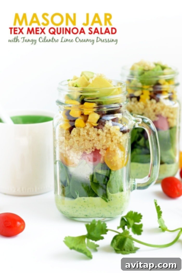 A mason jar salad with dressing on the bottom and ingredients layered on top, ready for meal prep.