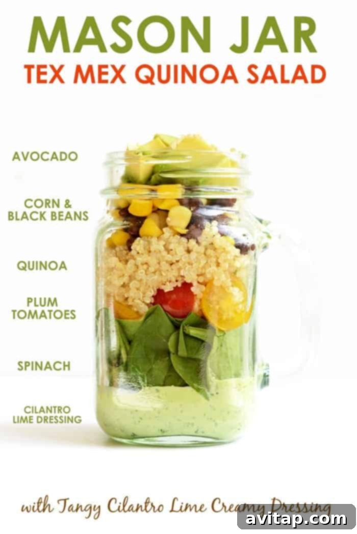 Mason jar salad ingredients layered beautifully in a clear mason jar.