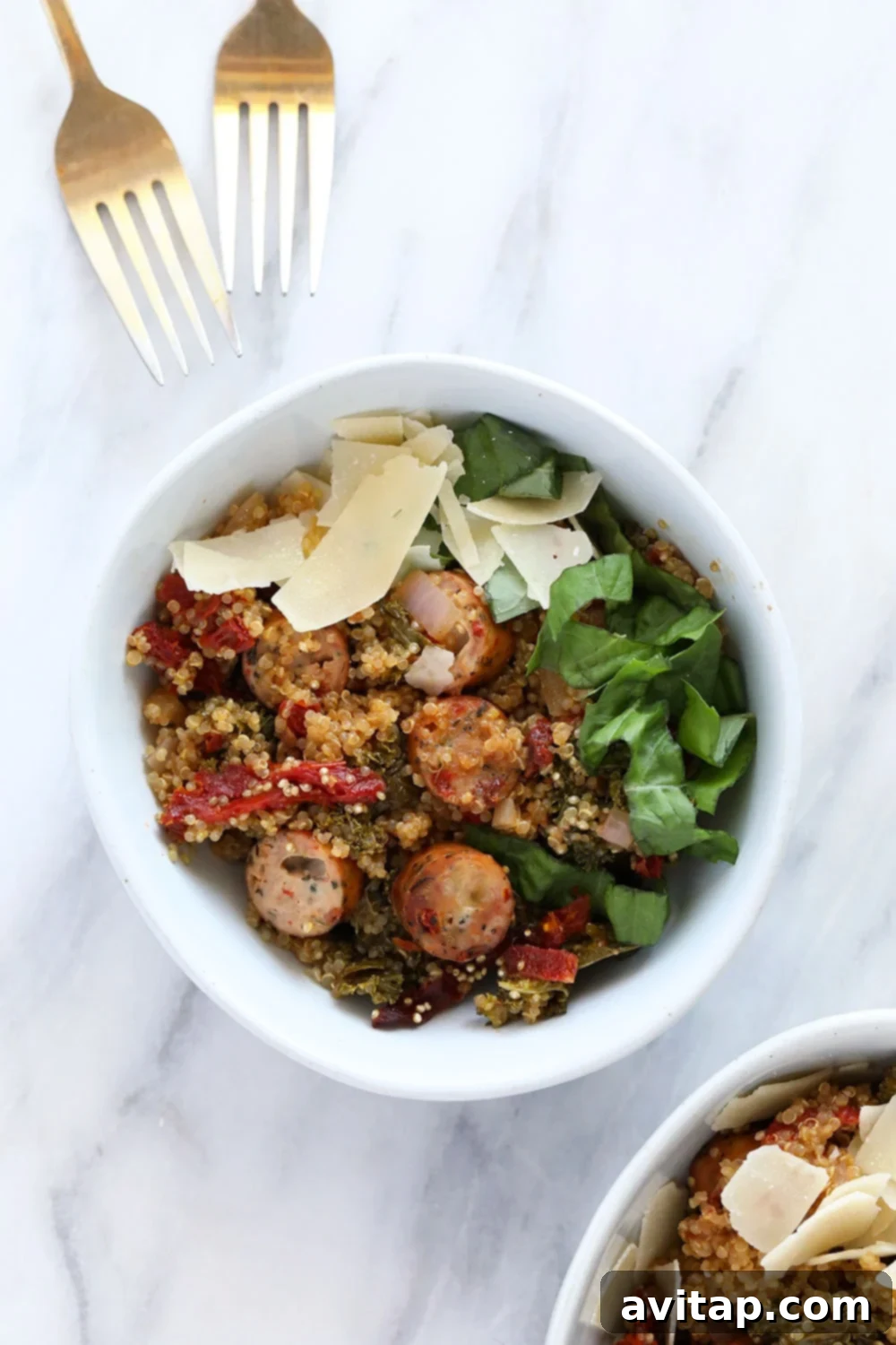 Delicious and healthy Italian Chicken Sausage Quinoa Casserole in a serving bowl, garnished with fresh basil.