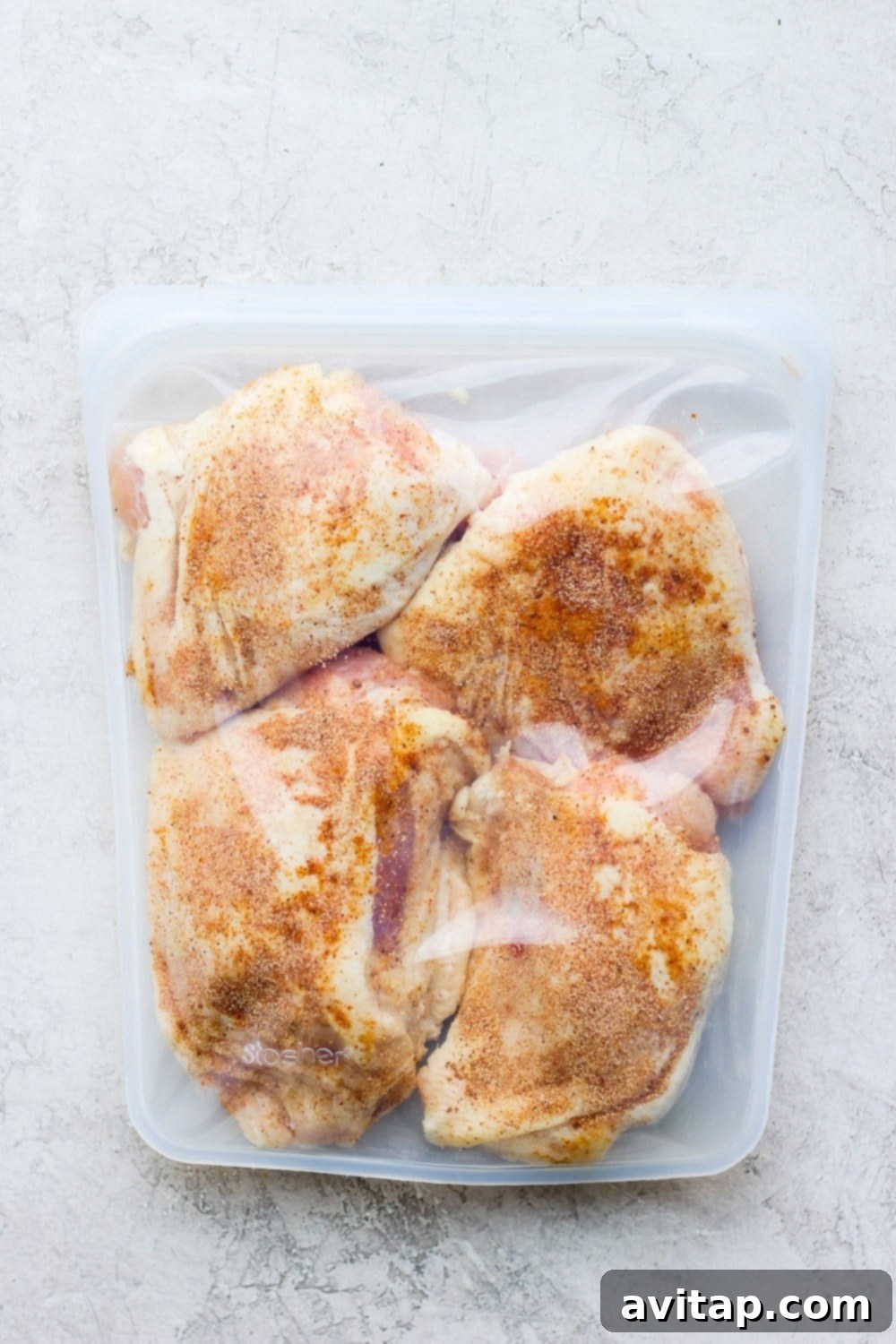 Seasoned chicken thighs in a Stasher bag, ready for sous vide cooking