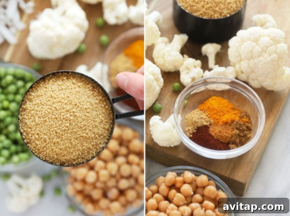 Fresh ingredients awaiting their transformation into a delicious Moroccan Chickpea Couscous. Individual ingredients for Moroccan Chickpea Couscous laid out, including fresh vegetables, chickpeas, and spices