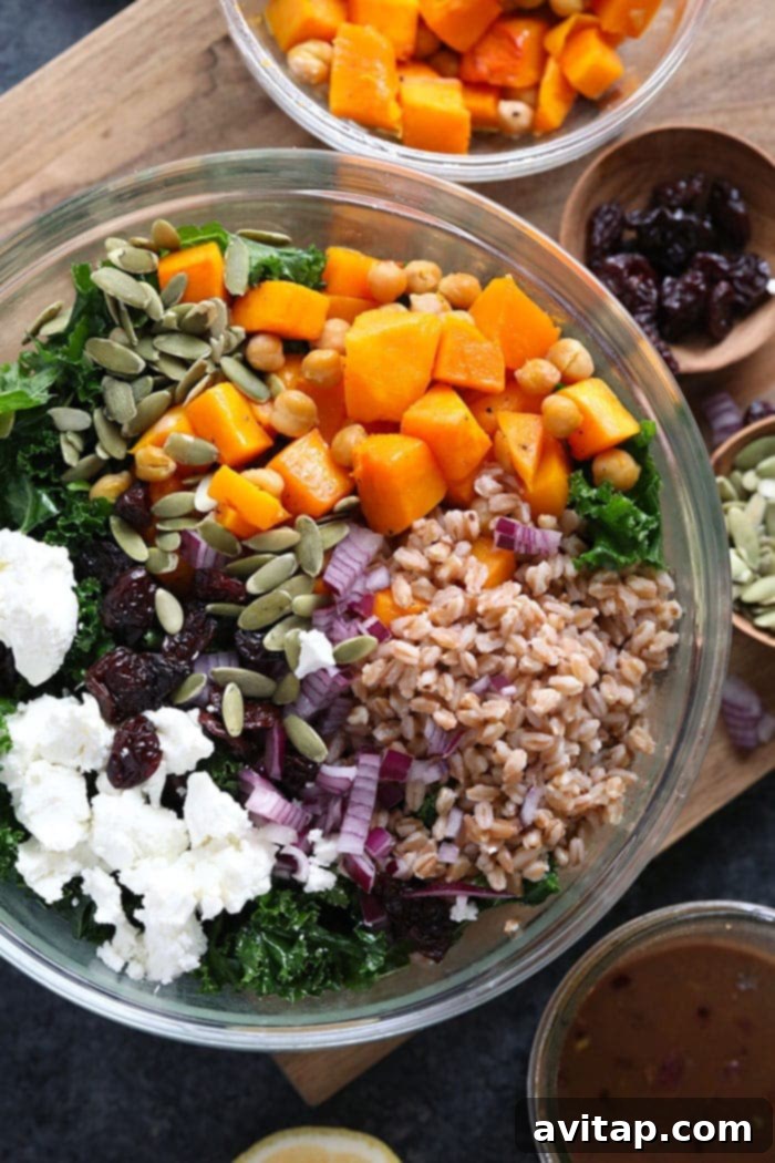 A large bowl filled with a colorful Farro Salad, showcasing all its ingredients beautifully mixed.