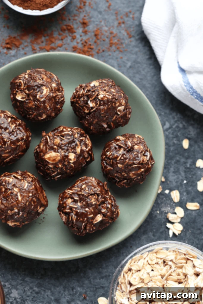 Chocolate Peanut Butter No-Bake Delights 2 A plate full of perfectly round, delicious chocolate energy balls, ready for snacking.