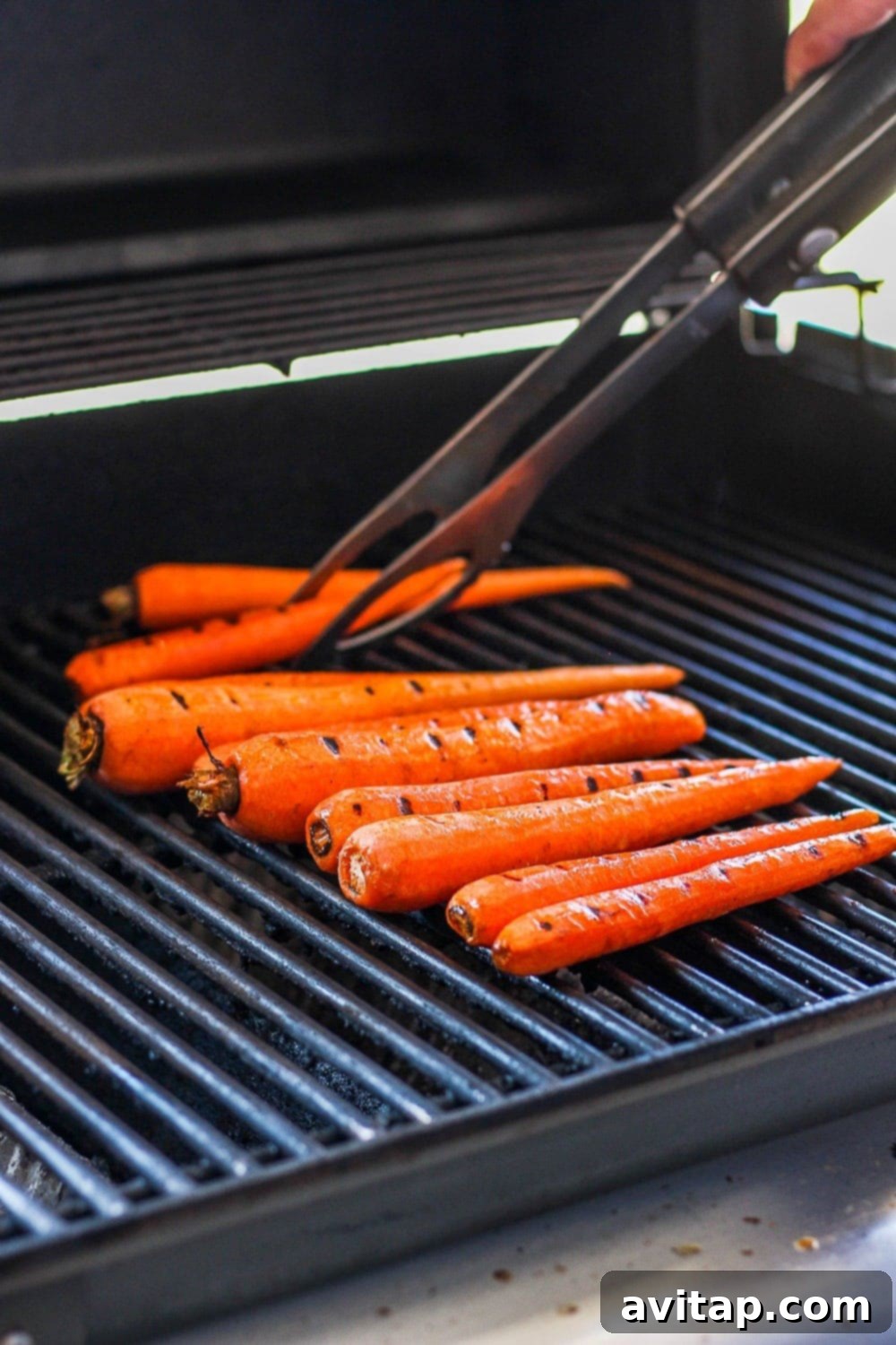 Grilling Carrots on the outdoor grill, showing beautiful char marks