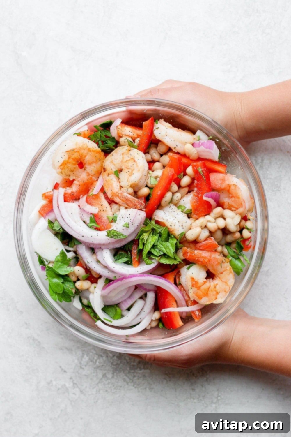 A beautiful healthy shrimp salad in a large bowl, showcasing colorful fresh ingredients and succulent shrimp, ready to be served