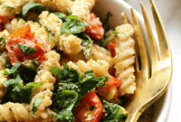 Velvety Cashew Cream Pasta with Sun-Ripened Tomatoes and Garden Kale