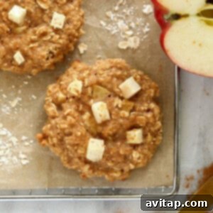 Apple oatmeal cookies on a cooling rack.