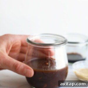 Homemade balsamic vinaigrette dressing in a mason jar.