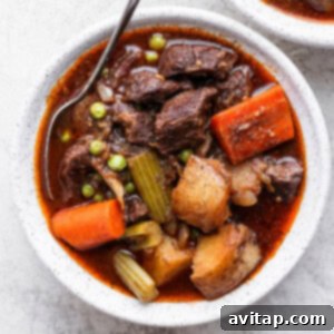 A hearty bowl of Instant Pot beef stew, rich with tender beef and vegetables.