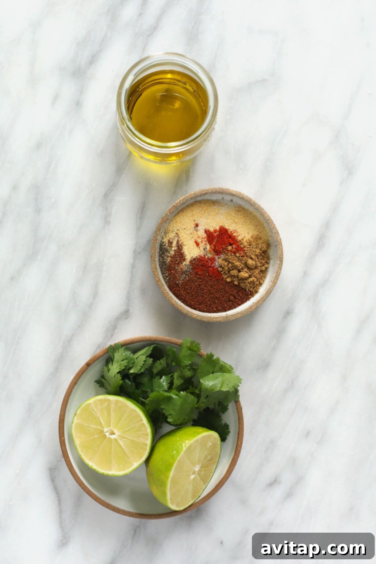 Chicken marinade ingredients laid out in small containers.