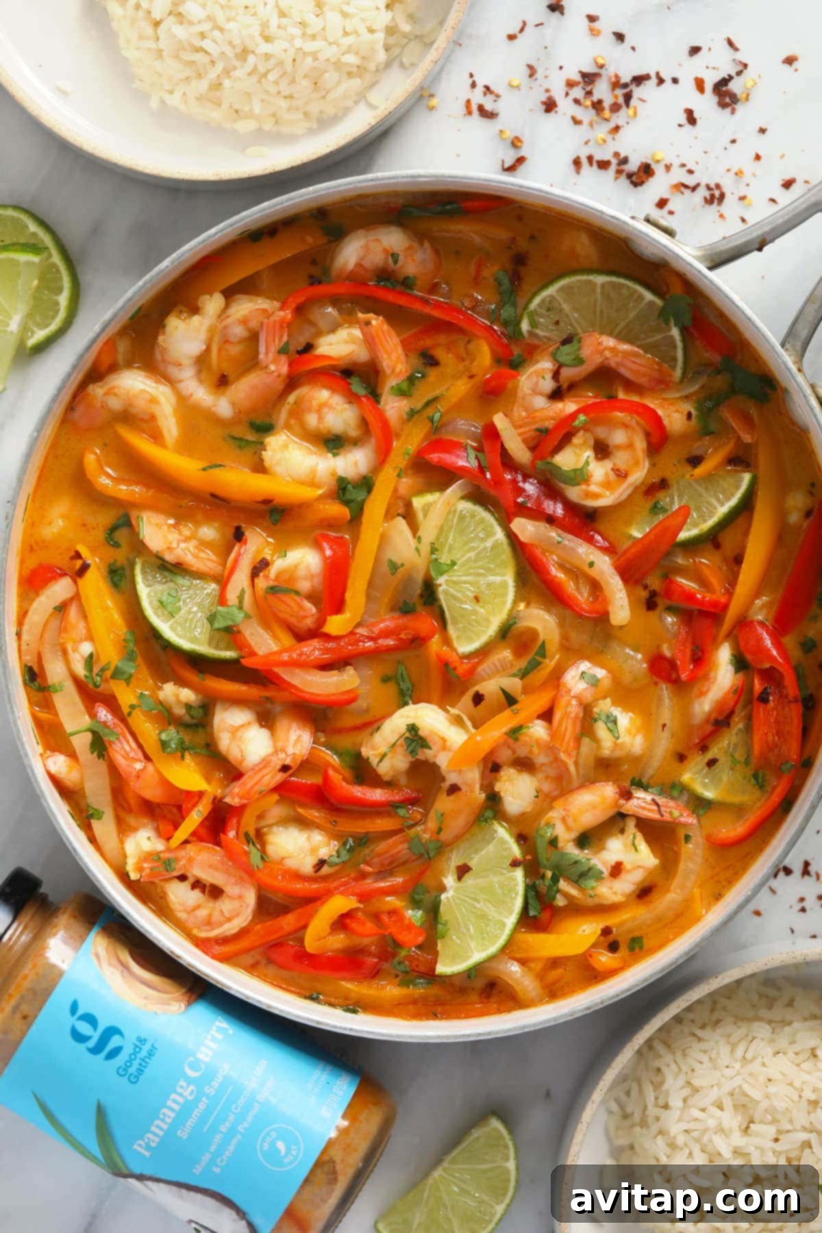 Quick and Creamy Panang Shrimp 5 Delicious Shrimp Panang curry, garnished and ready to be served directly from the pan, showcasing its rich texture.