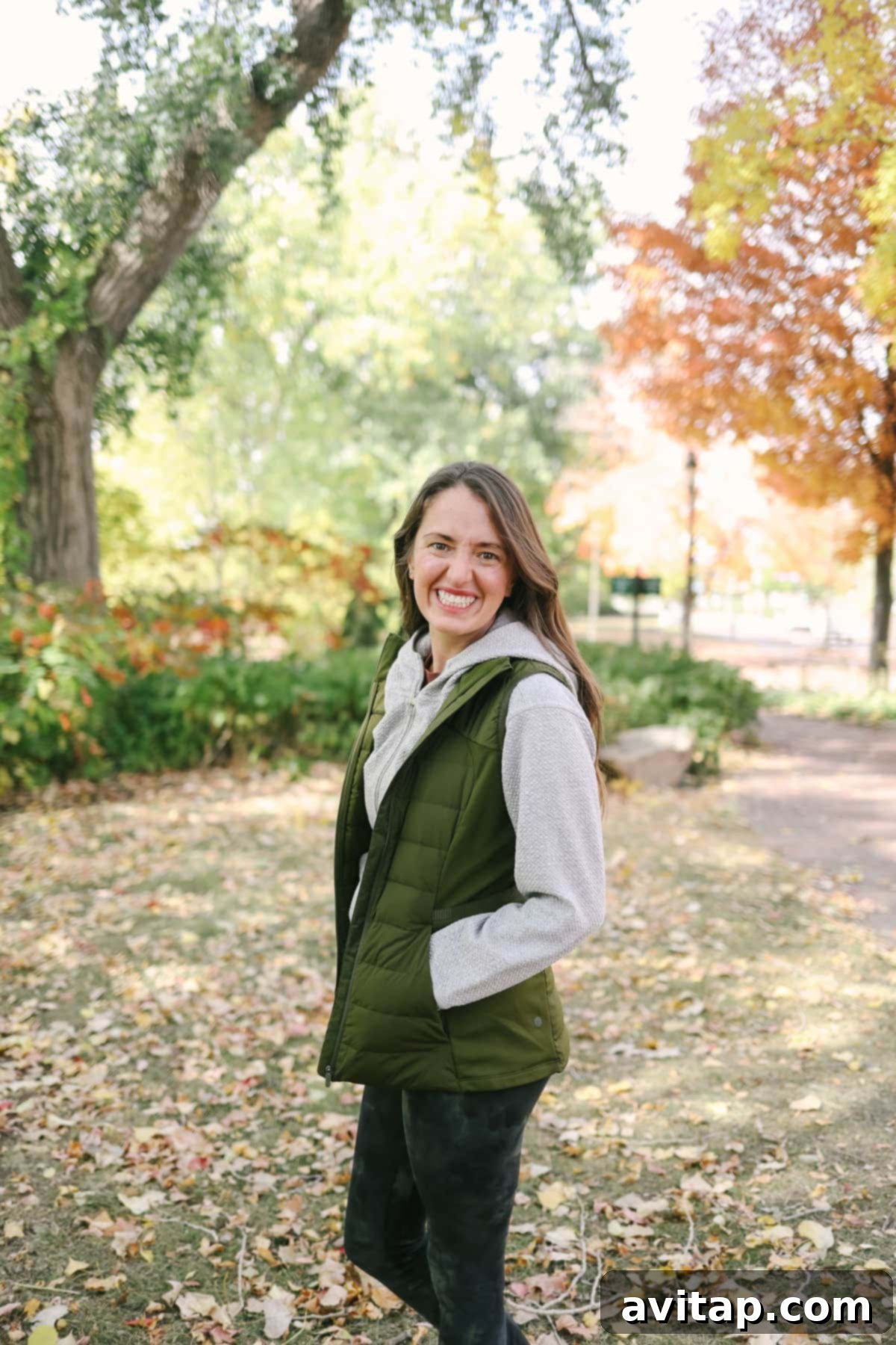 Linley wearing the Lululemon Down for it All Vest during an outdoor activity, highlighting its core warmth and freedom of movement.