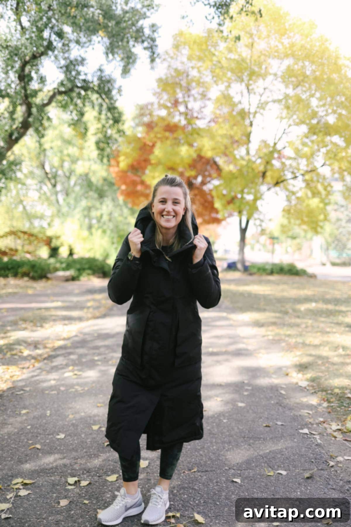 Emily wearing the Lululemon Winter Warrior Long Parka, demonstrating its extended length and superior warmth for extreme cold weather.