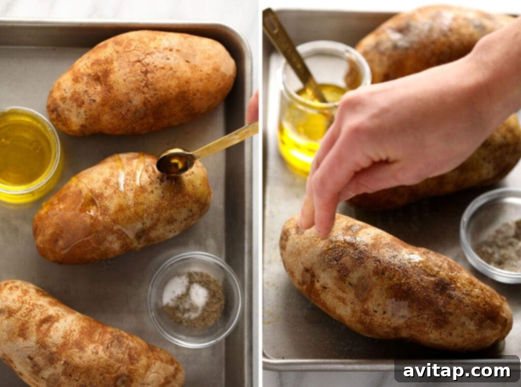 The Ultimate Crispy Fluffy Baked Potato 4 A freshly baked potato sliced open, revealing its fluffy interior, with butter melting on top.