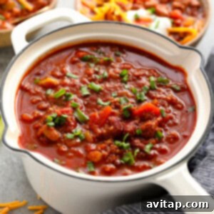No-Fuss Turkey Chili 3 A delicious bowl of turkey chili, topped with fresh garnishes.