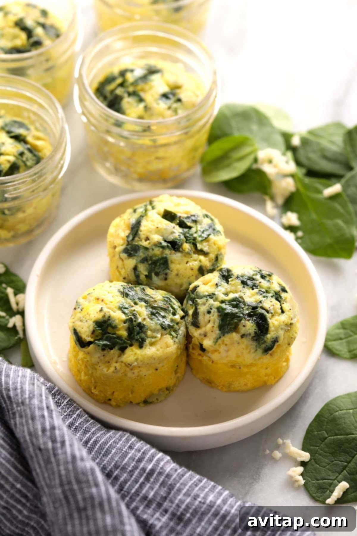 Fluffy Instant Pot Egg Bites 8 Instant Pot egg bites on a plate, garnished and ready for serving.